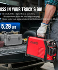 Person loading a Beefy 250 Amp Stick Welder With Dual Voltage 110V And 220V Auto Switching, LED Display Arc Welding Machine into a truck.