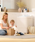 Compact 16 lb portable washer dryer combo in a small apartment laundry area with a woman and child folding clothes.