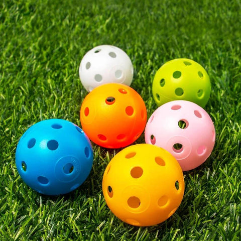 Practice Golf Training Balls Limited Flight 40mm Hollow Plastic Colored Airflow Golf Balls for Swing Practice, 12 Pack on grass
