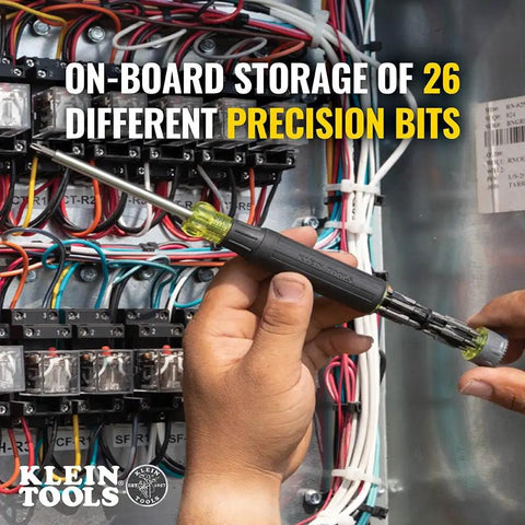 Person using All-In-One 27-In-1 Precision Screwdriver Set For Apple Device Repairs With Rare-Earth Magnet Barrel, 26 Precision Bits And 3.5mm Nut Driver, Magnetic Handle, Electronic Repair Kit By Klein Tools on electrical panel