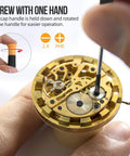 Close-up of a screwdriver adjusting a watch mechanism, showing a hand rotating the cap handle for precise control.
