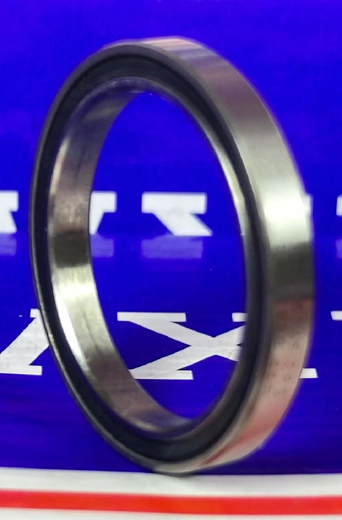 Premium 6705-2RS Thin Slim Bearing 25x32x4mm - Sealed Ball Bearing displayed from side view showing its chrome steel design.