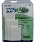 Pack of Pro UGlu adhesive strips with strong bond, visible packaging claims bonds to various surfaces, non-toxic, made in USA.