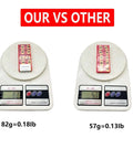 Comparison of two scales weighing metal inserts, left scale at 82g and right scale at 57g, with text 'OUR VS OTHER' above.