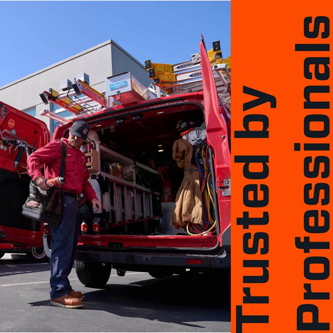 Technician with Low Viscosity Drip Oil loading tools into red work van, text 'Trusted by Professionals' highlighting product reliability