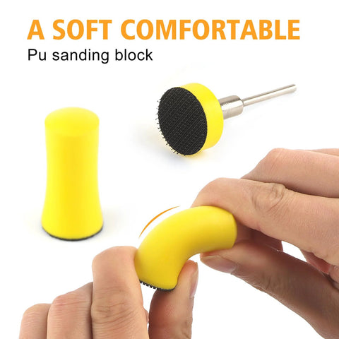 Hands holding a yellow 1 inch hook and loop sanding disc block, shown with backing pad, ideal for wet dry use, 180 pcs set, grits 60 to 10000.