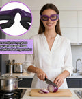 Woman in kitchen wearing Anti Fog Onion Goggles With Ultra Light Frame For Tear Free Cooking Purple, cutting onion