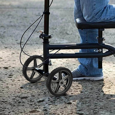 3 Pack 12 x 1.75 Inch Push Mower Replacement Wheels with Spoke Plastic Design and Diamond Tread on a utility cart outdoors