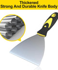 Close-up of a stainless steel putty knife with black and yellow soft grip handle, highlighting thickness and durability for heavy use.