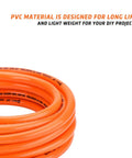 Coiled orange PVC hose from the Three Eighth Inch PVC Air Hose Kit 25 Foot With Seventeen Piece Accessory Set Featuring Solid Brass Ends