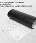 Rolled black and white PVC conveyor belt for industrial packing machines, showing non-slip perforated design, wear-resistant material.