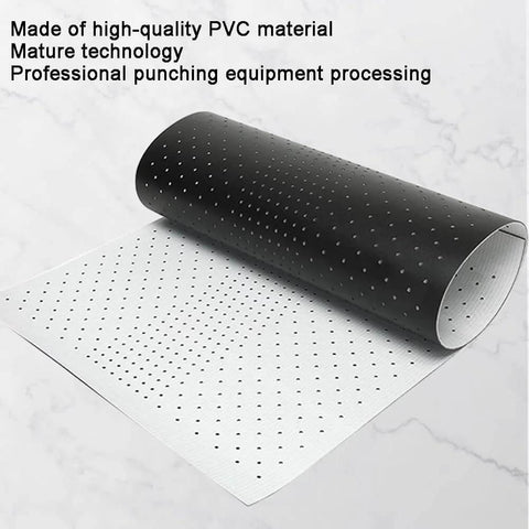 Rolled black and white PVC conveyor belt for industrial packing machines, showing non-slip perforated design, wear-resistant material.