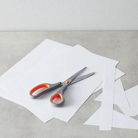 Stainless Steel Scissors Multipurpose Office And Craft Shears With PVD Coated Blades For Superior Cutting Power on paper background