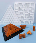 Pyramid Resin Puzzle Molds 2 Pack Silicone Mold For Epoxy Resin Casting And DIY Crafts displayed with finished pyramid and puzzle pieces.
