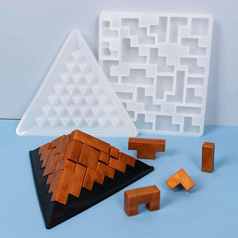 Pyramid Resin Puzzle Molds 2 Pack Silicone Mold For Epoxy Resin Casting And DIY Crafts displayed with finished pyramid and puzzle pieces.