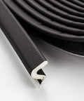 Close-up of Weather Stripping Door Seal Strip - Soundproof Q-Shaped Foam for Exterior Door Frame, Large Gap Seal in black, 26FT roll.