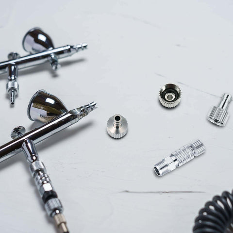 Quick Release Coupling Kit For Spray Gun Hoses, DIY Friendly 1/8 Inch BSP Male And Female Connectors on white surface