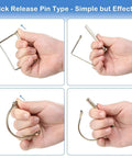 Hand holding 20 Piece Shaft Locking Pins Set One Quarter Inch Diameter Two And One Half Inch Length Square And Arch Safety Pins