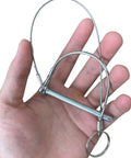 Person holding 10 Pack Trailer Coupler Pins 1/4 Inch Diameter And 2 3/4 Inch Length With Quick Release Ring and wire shaft