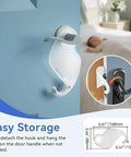 2 Pack Quiet Close Door Silencer Cushions for Noise Reduction, installed on a nursery door handle, transparent design.