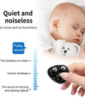 A hand holding 12 Pcs Self Adhesive Mini Caster Wheels For Small Appliances And Furniture, showcasing quiet operation next to sleeping baby.