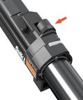 Close-up of Quik Drive tool adjustment knob on metal shaft with directional arrow for functionality guidance and secure fastening.