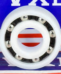 R18 Plastic Bearing - POM - SS316 Stainless Steel Balls - Food Grade - 1-1/8" x 2-1/8" x 1/2" inch with VXB background