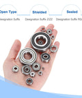 Hand holding Five Pcs R188 2RS Deep Groove Ball Bearings One Quarter Inch Inner Diameter One Half Inch Outer Diameter Three Sixteenth Inch Height P5 ABEC 5 Miniature Chrome Steel Shielded Z3 For Engineering