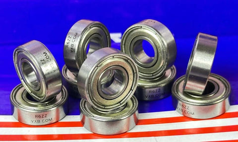 10-Pack Bearings R6ZZ 3/8" x 7/8" x 9/32" 3/8 Bore Bearings arranged on a surface showing chrome steel material and shield design.