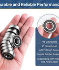 Person holding R8 2RS Ball Bearings 40 Pack With Half Inch Bore and One And One Eighth Inch Outer Diameter, showing dual rubber seals.