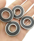 10 PCS R8-2RS Double Rubber Sealed Roller Ball Bearing 1/2 Inch Bore held in hand, used for electric motor, wheels, and appliances