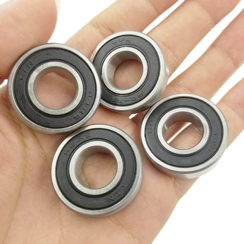 10 PCS R8-2RS Double Rubber Sealed Roller Ball Bearing 1/2 Inch Bore held in hand, used for electric motor, wheels, and appliances