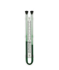 Radon system manometer with a clear plastic tube, used for measuring gas levels in radon mitigation systems
