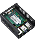 Raspberry Pi board with attached components in a protective black case, featuring USB ports and vents for cooling.