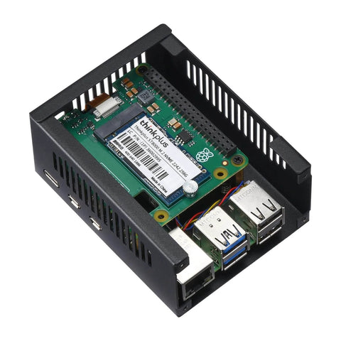 Raspberry Pi board with attached components in a protective black case, featuring USB ports and vents for cooling.