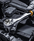 Mechanic using a ratchet wrench on an industrial engine part with 100 Pack 1/4-20 Nylon Insert Lock Nuts For Industrial Construction and Furniture Projects