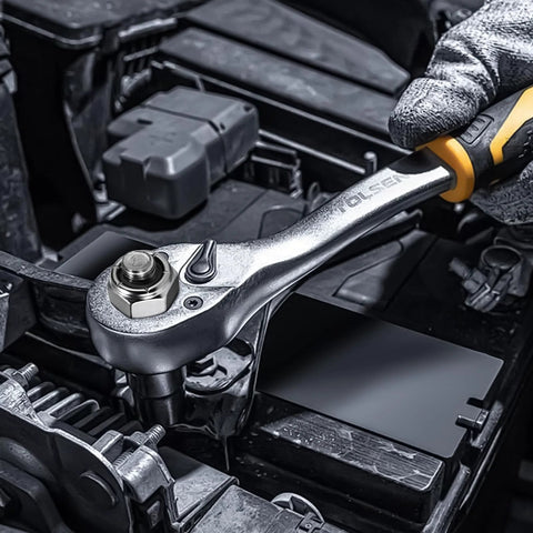 Mechanic using a ratchet wrench on an industrial engine part with 100 Pack 1/4-20 Nylon Insert Lock Nuts For Industrial Construction and Furniture Projects