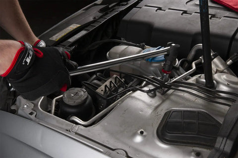 Three Eighths Inch Drive Ratcheting Adapter For Breaker Bar And T Handle, Converts Any Tool Into A Thumbwheel Ratchet A Handy Workhorse For Quick Tightening With Hex Bolster, Heavy Duty Chrome Vanadium, Oil Resistant Black Finish By Performance Tool in use on car engine