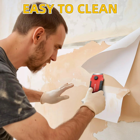 Man using Razor Blade Scraper With 15 Extra SK5 Blades And Built In Blade Storage Non Retractable Rubber Handle Cleaner for paint removal on wall.