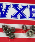 10-Pack RC Bearing 5x11x4 for Tamiya & Traxxas Miniature on red and white striped surface