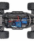 Top view of RC truck chassis showcasing 1000pcs Universal RC Screw Kit Hardware Assortment with M3 and M4 screws, washers, nuts.