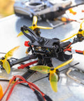 RC drone with visible silent, reliable RC vibration dampers that isolate the flight controller and gimbal, fits F4/F7 mounts.