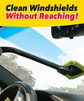 Reach Free Windshield Cleaning Tool With 16 Inch Detachable Handle Microfiber Window Cleaning Device in use inside a car.