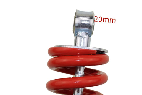 Close-up of a red spring and metal mount on a Rear Shock Absorber 270 Millimeter Center To Center Mounting For Quad ATV Dirt Bike Pit Bike Go Kart Buggy 980 Pound Load With Sensa Trac Suspension Durable Beefed Up Heavy Duty Built To Last For 4 Wheel Vehicles.