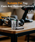 Rechargeable AA And AAA Lithium Batteries 8 Slot Charger 3800mWh with toy car and remote on table
