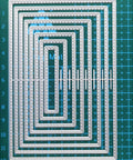 8 Piece Rectangle Cutting Die Set For Scrapbooking And Card Making Includes Eight Size Options 12x8cm to 5x1cm on green mat