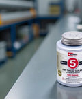 No 5 Pipe Thread Sealant That Keeps Threads Moving Smoothly With A Non Hardening Slow Drying Formula Soft Set For Easy Breakout And Tight Seal Lubricates And Protects Threads Contains No Other Metals 8 Oz By RectorSeal on metal surface in industrial setting