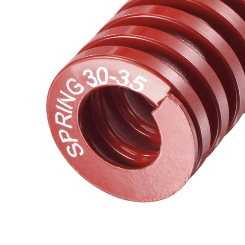 Close-up of Red 65Mn Die Spring For Molds And 3D Printer Applications, 30mm outer diameter, showing part number marking.