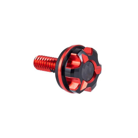 CNC Machined Knurled Harley Seat Bolt Kit with a hard anodized finish and one quarter inch threads, red and black bolt close-up