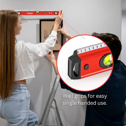 24 inch box level with three durable acrylic vials, precise 1/16 inch ruler, wall grip, and hand calibrated straightedge used on wall